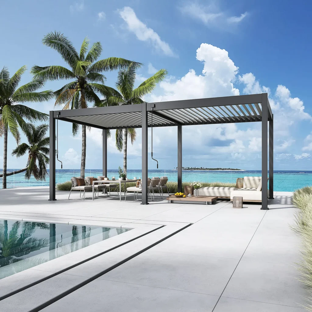 Freestanding bioclimatic pergola beside a pool with palm trees