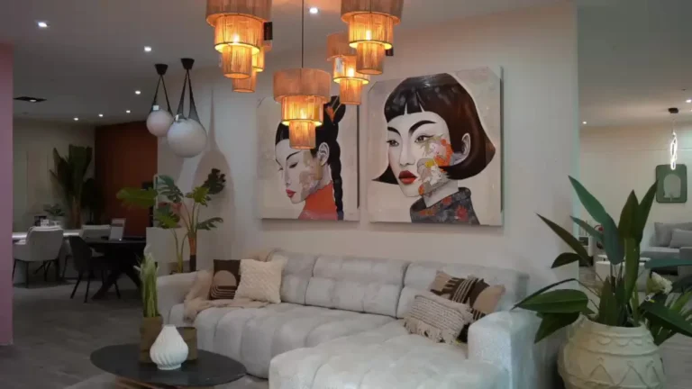White sofa under woven pendant lights